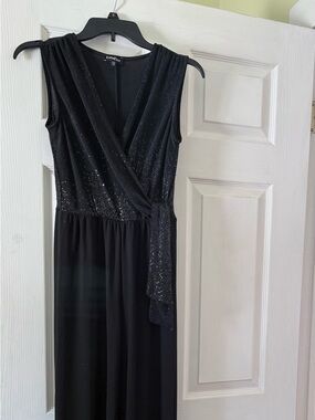 BEBE  Black Sleeveless Sequin jumpsuit absolutely beautiful